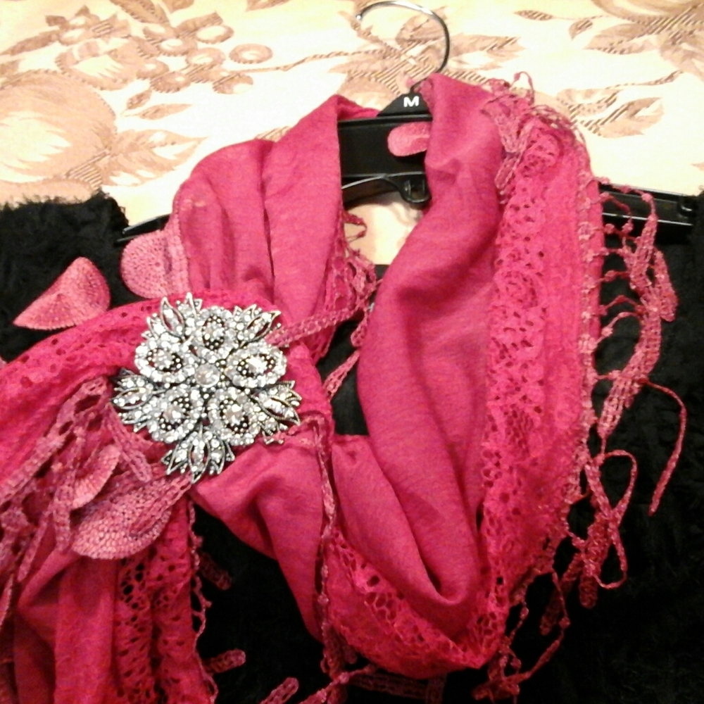 Ladies red scarf with magnetic sparkle pendent.